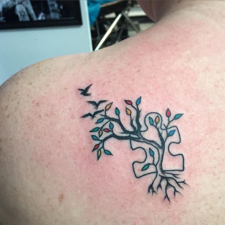 Fine line autism tree and bird tattoo design for women on shoulder tattoo ideas
