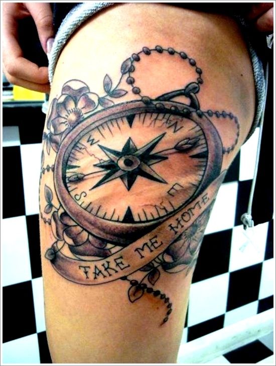 Black and grey compass and floral tattoo design for women on thigh tattoo ideas