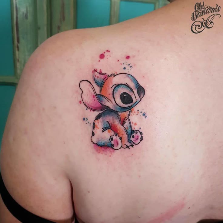 Watercolor Stitch tattoo design for women on shoulder tattoo ideas
