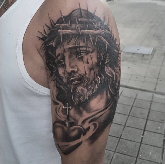 Realistic Jesus, heart and cross tattoo design for men on arm tattoo ideas