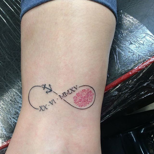 Fine line infinity loop with anchor, fingerprint and Roman numerals tattoo design for women on ankle tattoo ideas