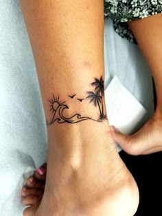 Linework sun, clouds, and palm trees tattoo design for women on ankle tattoo ideas
