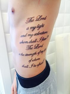 Script quote tattoo design for men on rib tattoo ideas