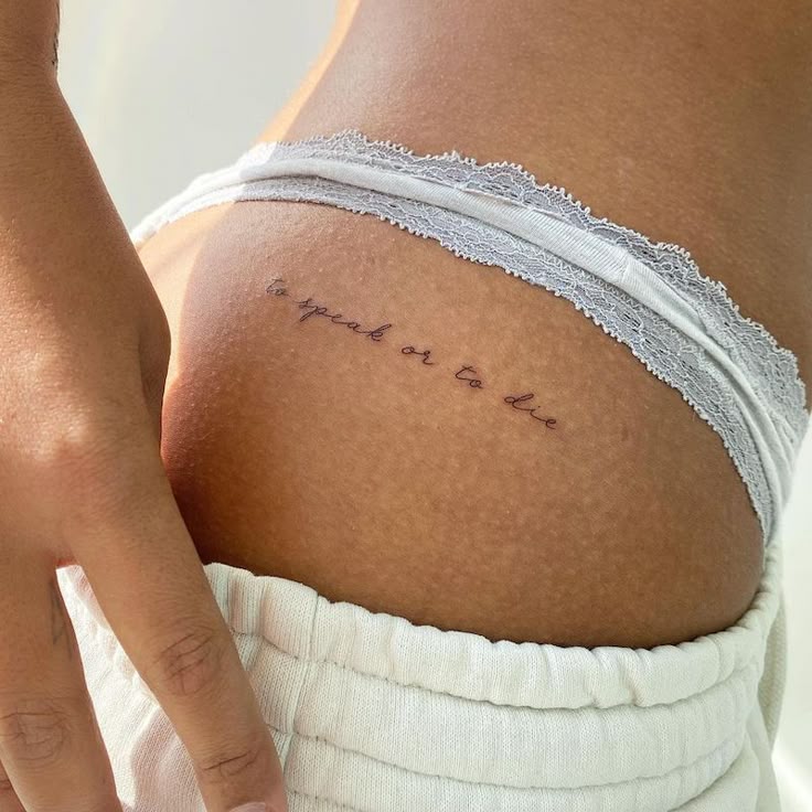 Fine line word tattoo design for women on hip tattoo ideas