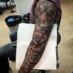 Realistic tiger, rose, and clock full sleeve tattoo design for men tattoo ideas