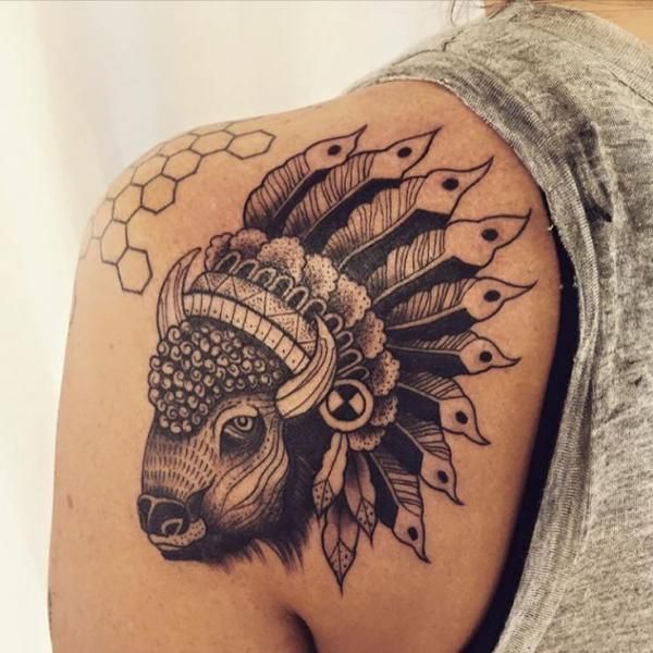Black and grey feather tattoo design for men and women on shoulder tattoo ideas
