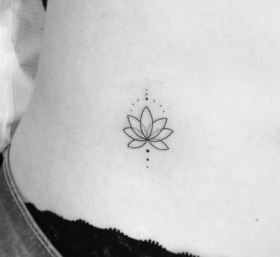 Fine line lotus flower with geometric pattern tattoo design for women on hip tattoo ideas