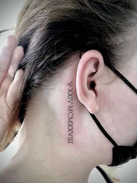 Fine Line Roman numeral tattoo design for women on neck tattoo ideas