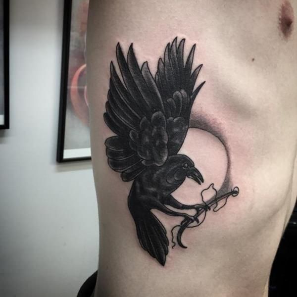 Blackwork raven moon tattoo design for men on rib tattoo ideas