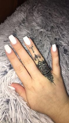 Fine Line flower and floral tattoo design for women on finger tattoo ideas
