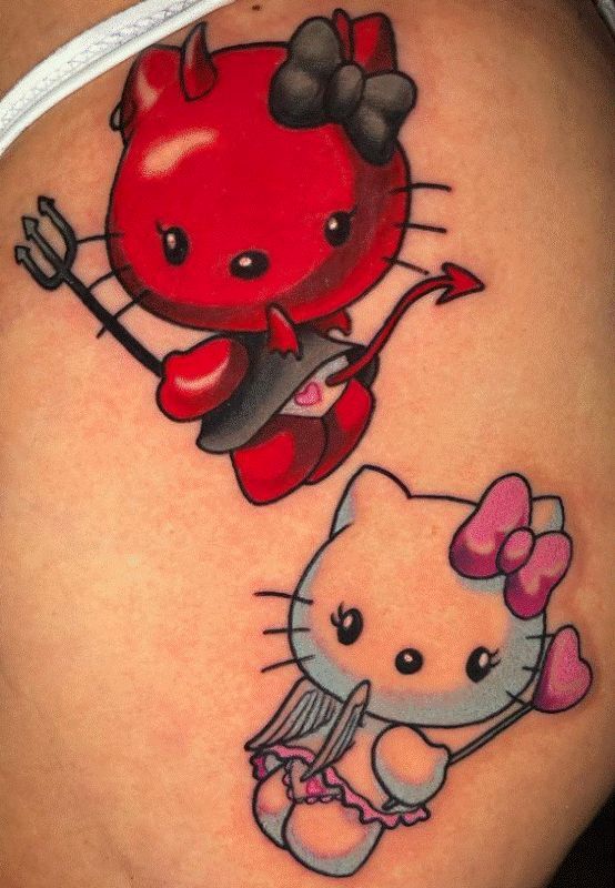 Cartoon Hello Kitty heart tattoo design for women on hip tattoo ideas