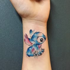 Watercolor Stitch tattoo design for women on wrist tattoo ideas