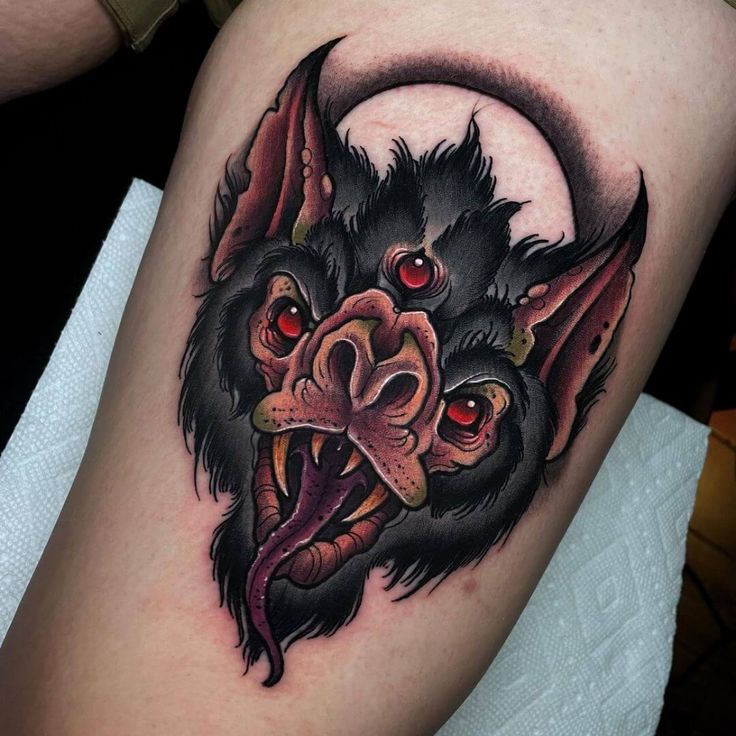 Traditional bat tattoo design for men and women on thigh tattoo ideas