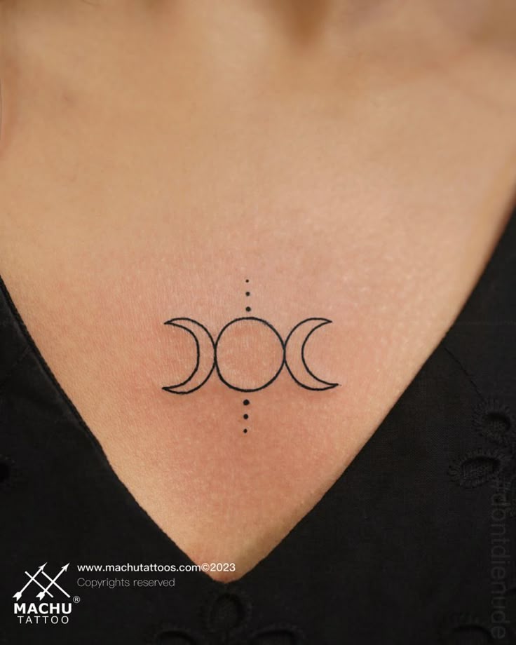 Fine line moon and sun tattoo design for women on chest tattoo ideas