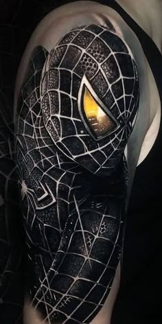 Realistic Spider-Man tattoo design for men on shoulder and upper arm tattoo ideas
