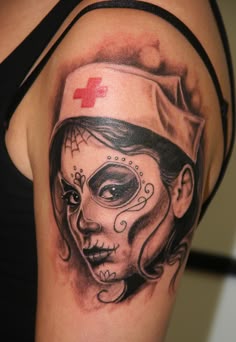 Realistic sugar skull nurse tattoo design for women on bicep tattoo ideas