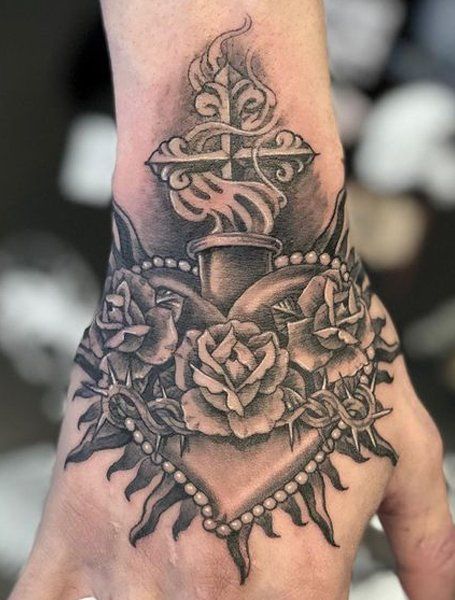 Realistic rose, cross, and heart tattoo design for men and women on hand tattoo ideas