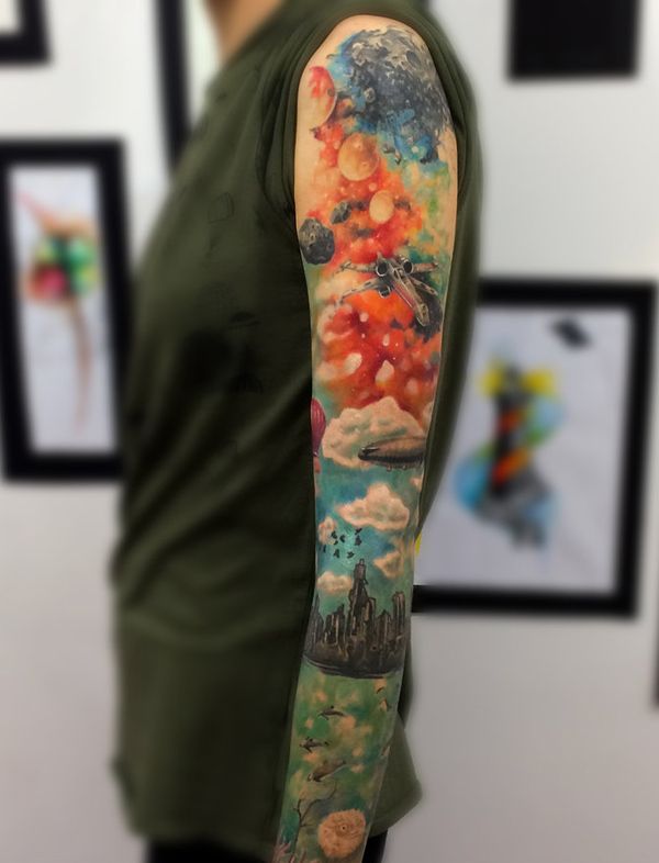 Watercolor space, city, and cars tattoo design for women and men on arm, full sleeve tattoo ideas