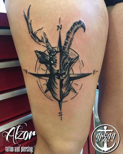 Realistic deer and compass tattoo design for men and women on thigh tattoo ideas