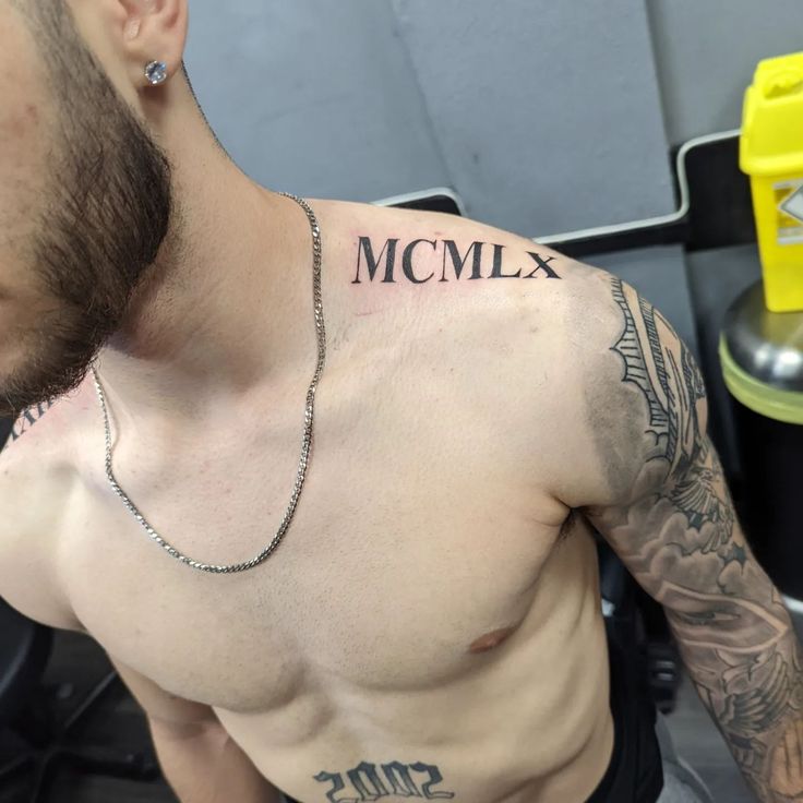 Roman numeral MCMLX and eagle tattoo design for men on shoulder and arm tattoo ideas