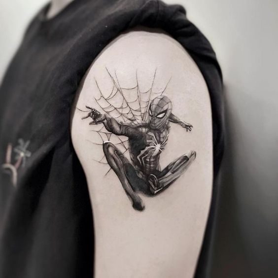 Realistic Spiderman tattoo design for men on shoulder with spider web tattoo ideas