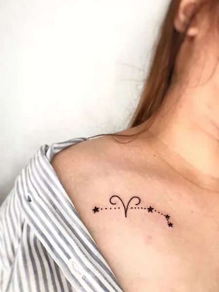 Minimalist Aries and star tattoo design for women on chest tattoo ideas