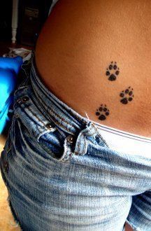Minimalist paw print tattoo design for women on hip tattoo ideas