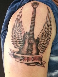 Guitar with wings tattoo design for men, women on bicep tattoo ideas