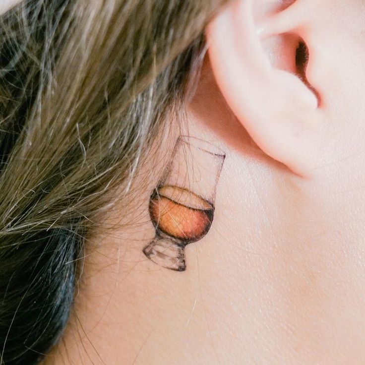Realistic bourbon glass tattoo design for women on neck tattoo ideas
