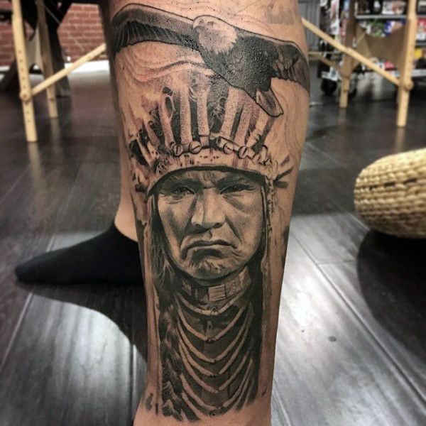 Realistic Native American and eagle tattoo design for men on leg tattoo ideas