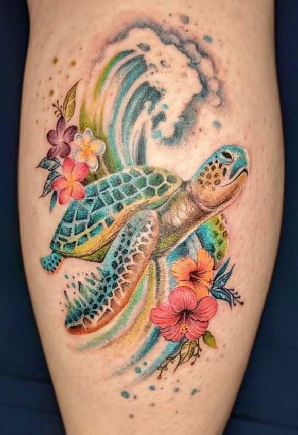 Watercolor turtle and floral tattoo design for women on thigh tattoo ideas