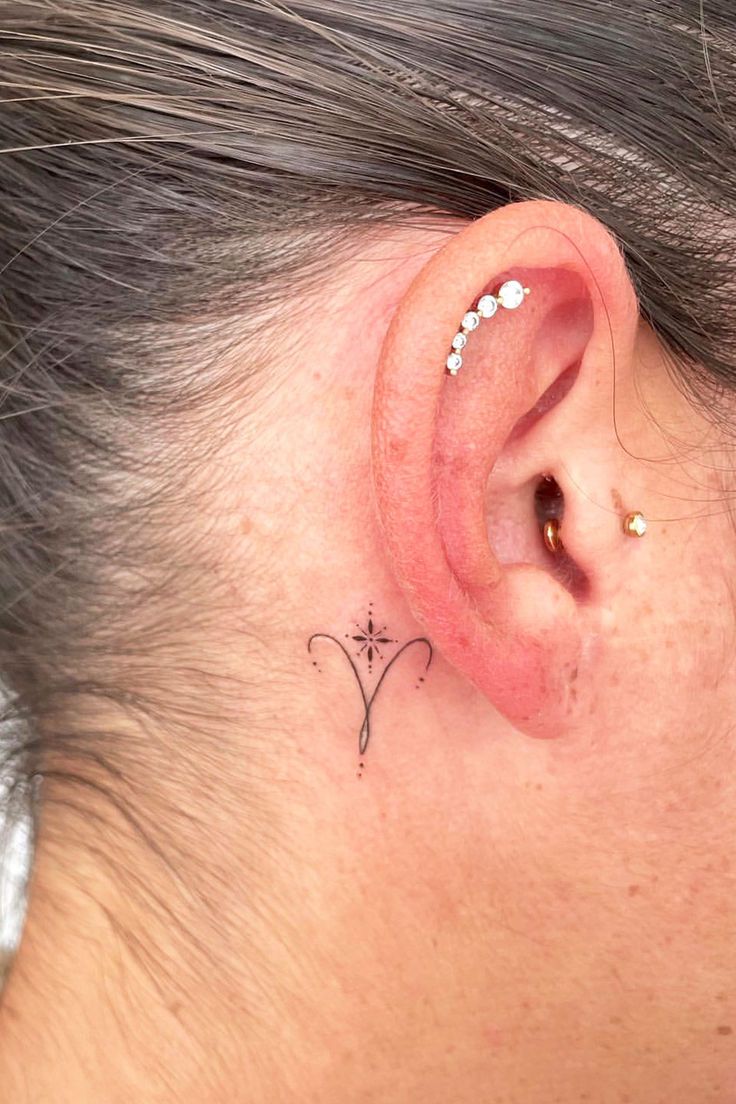 Fine line Aries tattoo design for women on neck tattoo ideas