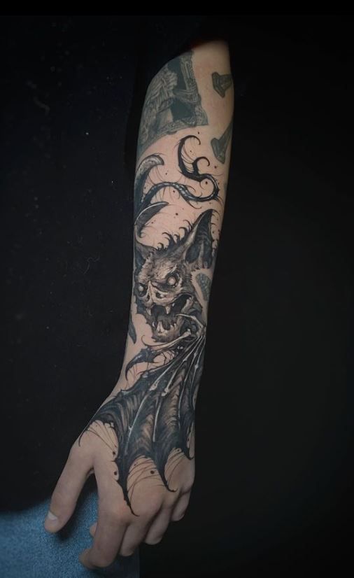Realistic bat tattoo design for men on forearm and hand tattoo ideas