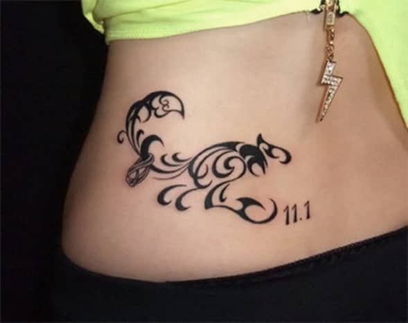 Tribal scorpion tattoo design for women on hip tattoo ideas