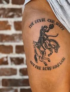 Traditional warrior and quote tattoo design for men on thigh tattoo ideas