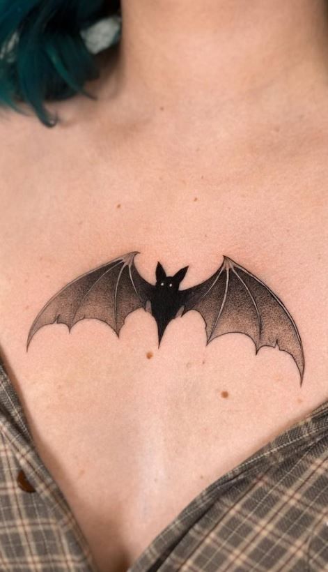 Blackwork bat tattoo design for women on chest tattoo ideas