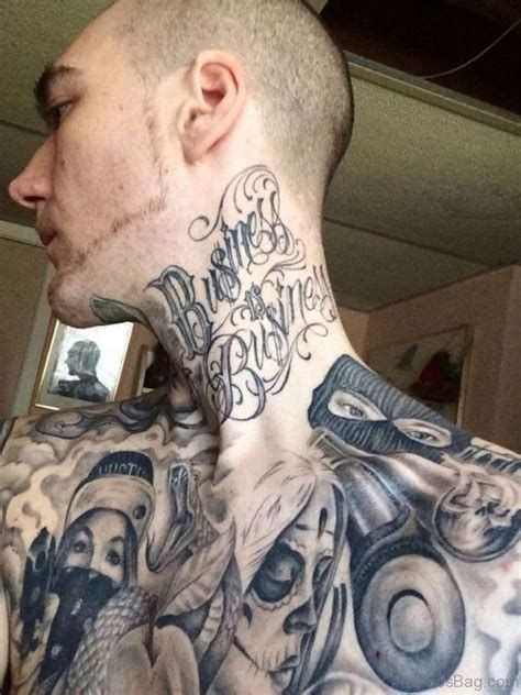 Black and grey skull and quote tattoo design for men on neck and chest tattoo ideas