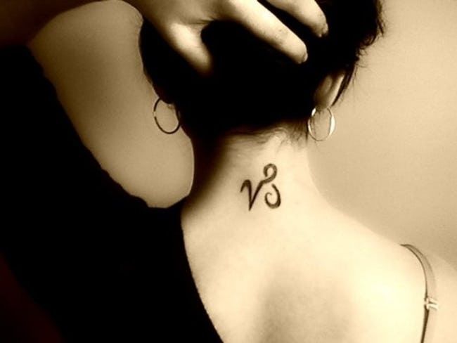 Minimalist Capricorn tattoo design for women on neck tattoo ideas