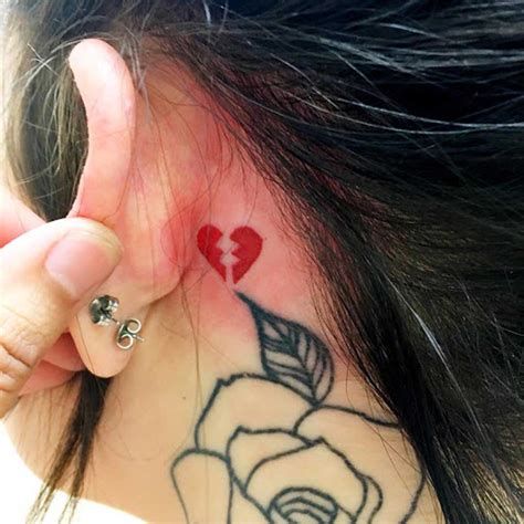 Minimalist broken heart tattoo idea for women behind the ear and neck tattoo ideas
