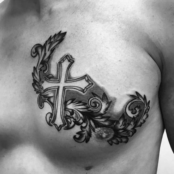 Black and grey cross and floral tattoo design for men on chest tattoo ideas