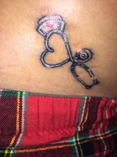 Linework heart stethoscope nurse tattoo design for women on hip tattoo ideas