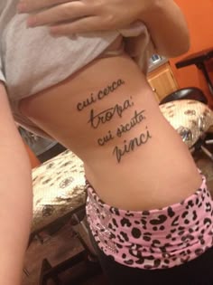 Script tattoo idea for women on the rib tattoo ideas