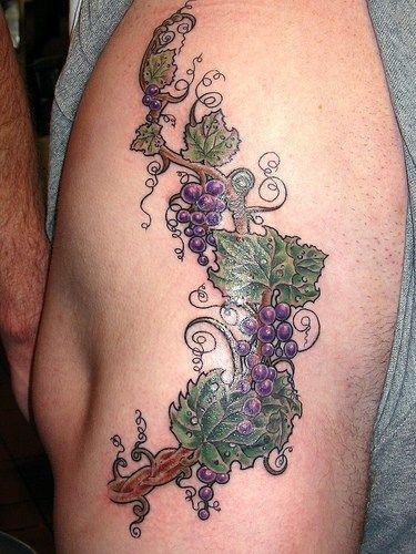 Realistic grape vine tattoo design for men on leg, hip tattoo ideas