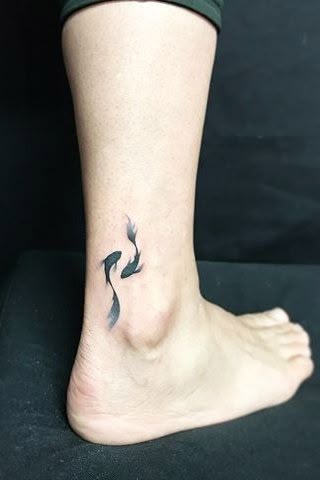 Koi fish tattoo design with brushstroke style for men and women on ankle tattoo ideas
