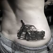 Realism car tattoo design for women with rider on rib tattoo ideas