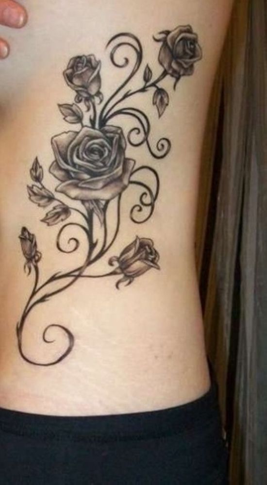 Black and grey rose tattoo design for women on rib tattoo ideas