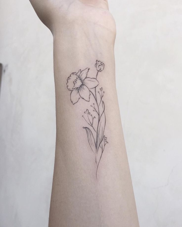 Fine line flower tattoo design for women on wrist tattoo ideas