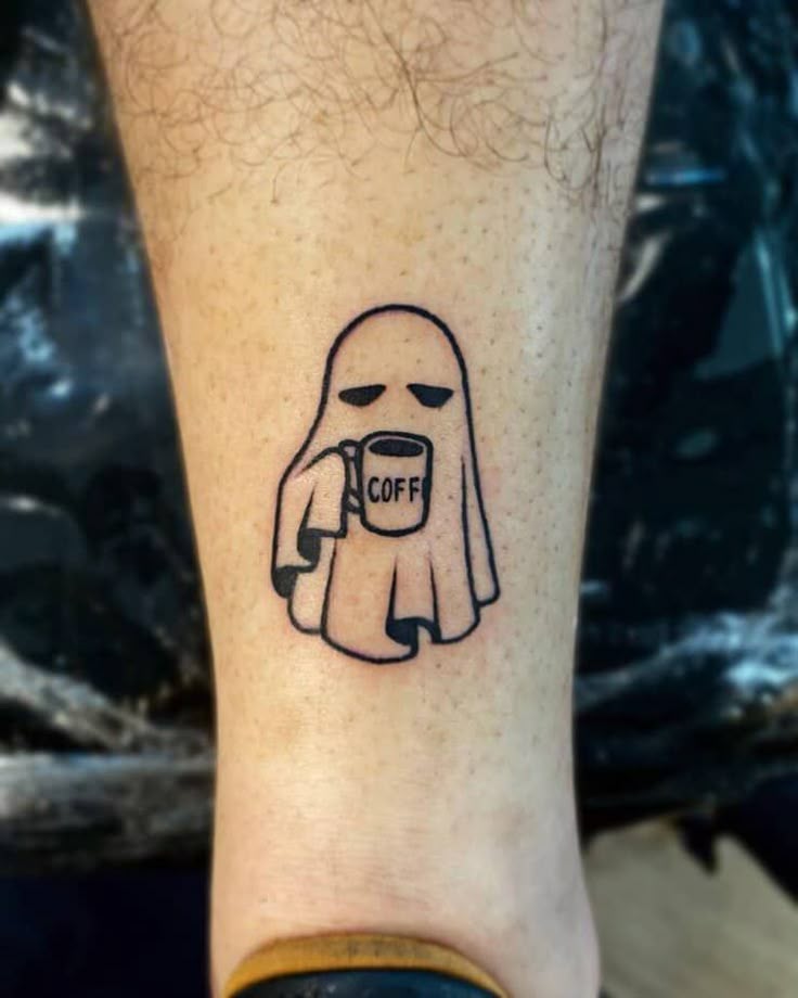 Minimalist ghost with coffee mug tattoo design for men and women on ankle tattoo ideas