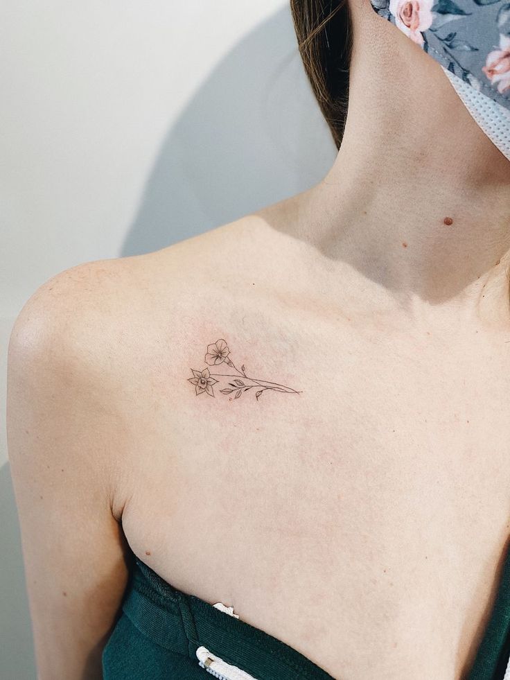 Fine Line floral tattoo design for women on chest tattoo ideas