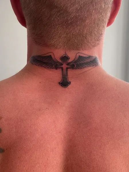 Black and grey cross and wing tattoo design for men on neck tattoo ideas